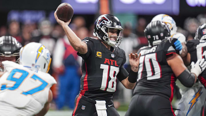 Atlanta Falcons quarterback Kirk Cousins passes against the Los Angeles Chargers during the first half at Mercedes-Benz Stadium in Atlanta on Dec. 1, 2024. Atlanta Falcons quarterback Kirk Cousins passes against the Los Angeles Chargers during the first half at Mercedes-Benz Stadium in Atlanta on Dec. 1, 2024.