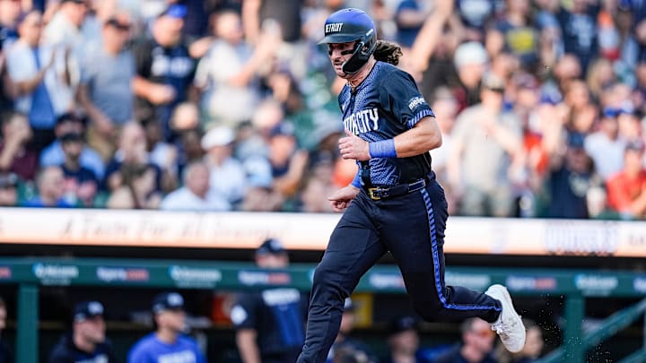 Detroit Tigers right fielder Ryan Vilade (50) runs for a RBI from a triple hit by left fielder Justyn-Henry Malloy (44) against L. A. Dodgers during the second inning at Comerica Park in Detroit on Friday, July 12, 2024.