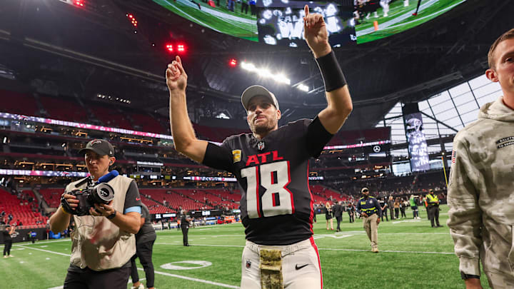 Nov 3, 2024; Atlanta, Georgia, USA; Atlanta Falcons quarterback Kirk Cousins (18) celebrates after a victory over the Dallas Cowboys at Mercedes-Benz Stadium. Mandatory Credit: Brett Davis-Imagn Images
