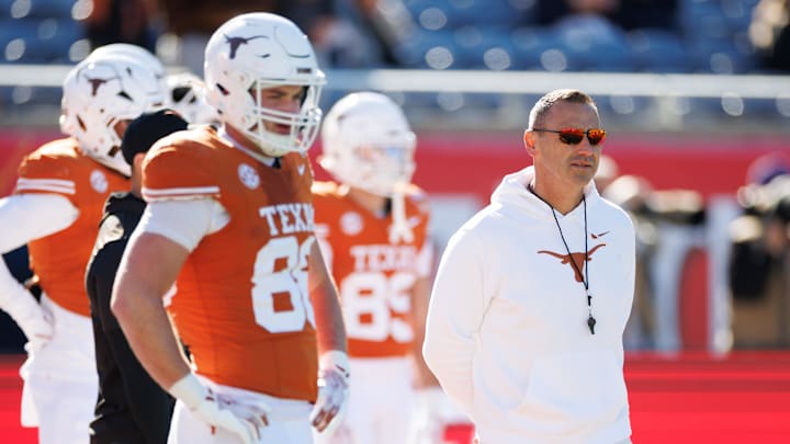 Dec 31, 2025; Orlando, FL, USA; Texas Longhorns head coach Steve Sarkisian looks on before a game against the Michigan Wolverines at Camping World Stadium. Mandatory Credit: Matt Pendleton-Imagn Images