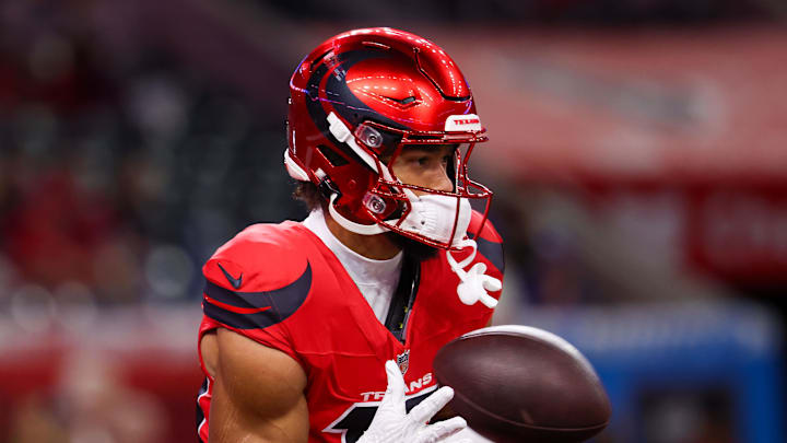 Nov 20, 2025; Houston, Texas, USA;  Houston Texans wide receiver Xavier Hutchinson (19) warms up before playing against the Buffalo Bills at NRG Stadium. Mandatory Credit: Thomas Shea-Imagn Images