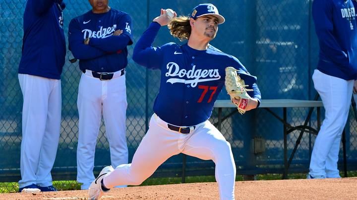 Feb 17, 2026; Glendale, AZ, USA; Los Angeles Dodgers pitcher Ryan River (77) throws during a Spring Training workout at Camelback Ranch. Mandatory Credit: Matt Kartozian-Imagn Images