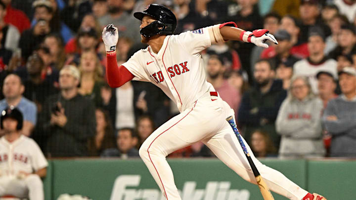 Jun 9, 2025; Boston, Massachusetts, USA; Boston Red Sox second baseman Kristian Campbell (28) hits a RBI against the Tampa Bay Rays during the ninth inning at Fenway Park. Mandatory Credit: Brian Fluharty-Imagn Images
