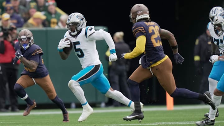 Carolina Panthers running back Rico Dowdle (5) sprints and picks up 29 yards during the second quarter of their game against the Green Bay Packers Sunday, November 2, 2025 at Lambeau Field in Green Bay, Wisconsin.