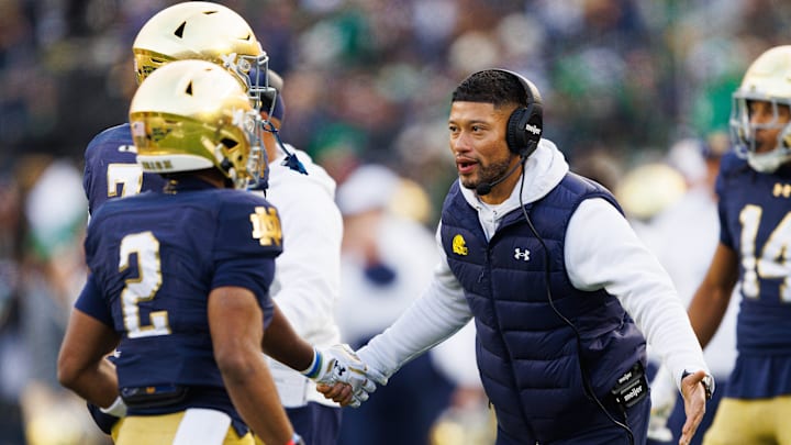 Notre Dame head coach Marcus Freeman celebrates after a touchdown in the first half of a NCAA football game against Syracuse at Notre Dame Stadium on Saturday, Nov. 22, 2025, in South Bend. Notre Dame head coach Marcus Freeman celebrates after a touchdown in the first half of a NCAA football game against Syracuse at Notre Dame Stadium on Saturday, Nov. 22, 2025, in South Bend.