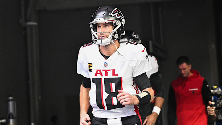 Dec 8, 2024; Minneapolis, Minnesota, USA; Atlanta Falcons quarterback Kirk Cousins (18) enters the field before the game against the Minnesota Vikings at U.S. Bank Stadium. Mandatory Credit: Jeffrey Becker-Imagn Images