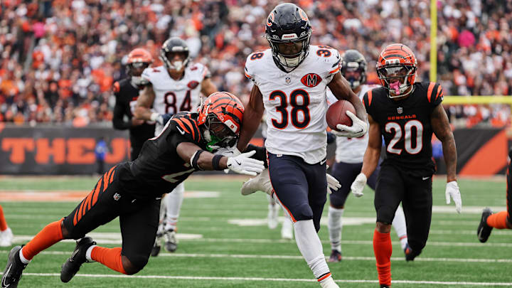 Nov 2, 2025; Cincinnati, Ohio, USA; Chicago Bears running back Brittain Brown (38) runs for a touchdown against Cincinnati Bengals safety Jordan Battle (27) and cornerback DJ Turner II (20) during the third quarter at Paycor Stadium. Mandatory Credit: Joseph Maiorana-Imagn Images