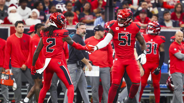 Dec 21, 2025; Houston, Texas, USA; Houston Texans defensive end Will Anderson Jr. (51) and safety Calen Bullock (2) react to a play against the Las Vegas Raiders during the second quarter at NRG Stadium. Mandatory Credit: Troy Taormina-Imagn Images