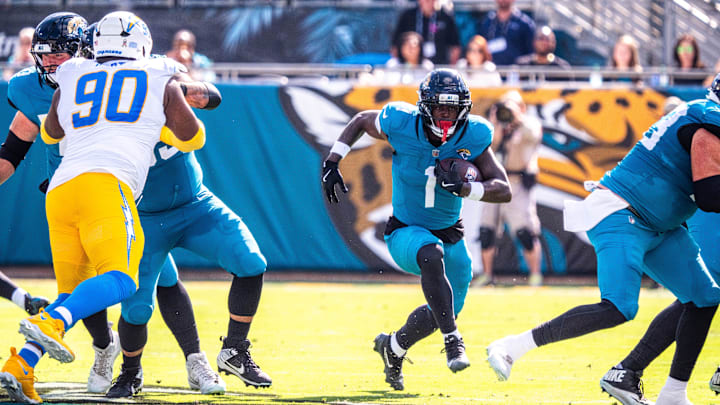 Jacksonville Jaguars running back Travis Etienne Jr. (1) finds a hole during the first quarter in an NFL football game at EverBank Stadium, Sunday, November 16, 2025, in Jacksonville, Fla. [Doug Engle/Florida Times-Union]
