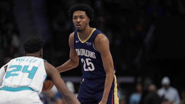 New Orleans Pelicans forward Trey Murphy III (25) handles the ball against Charlotte Hornets forward Brandon Miller New Orleans Pelicans forward Trey Murphy III (25) handles the ball against Charlotte Hornets forward Brandon Miller