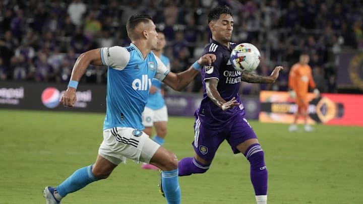 Apr 30, 2022; Orlando, Florida, USA; Orlando City forward Facundo Torres (17) and Charlotte FC
