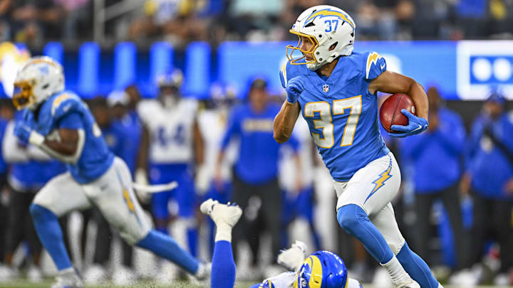 Los Angeles Chargers wide receiver Luke Grimm runs the ball for a touchdown against the Los Angeles Rams.