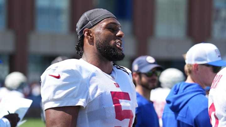 Jul 26, 2024; East Rutherford, NJ, USA; New York Giants linebacker Kayvon Thibodeaux (5) speaks on the sideline during Quest Diagnostics Training Center training camp.  
