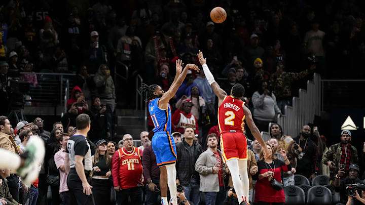 Jan 3, 2024; Atlanta, Georgia, USA; Oklahoma City Thunder guard Isaiah Joe (11) misses a three point