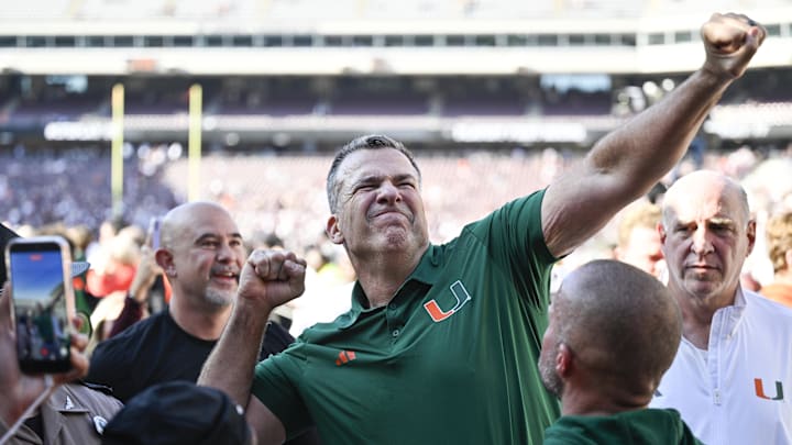 Dec 20, 2025; College Station, TX, USA; Miami Hurricanes head coach Mario Cristobal celebrates after defeating the Texas A&M Aggies in the first round game of the CFP National Playoff at Kyle Field. Mandatory Credit: Jerome Miron-Imagn Images