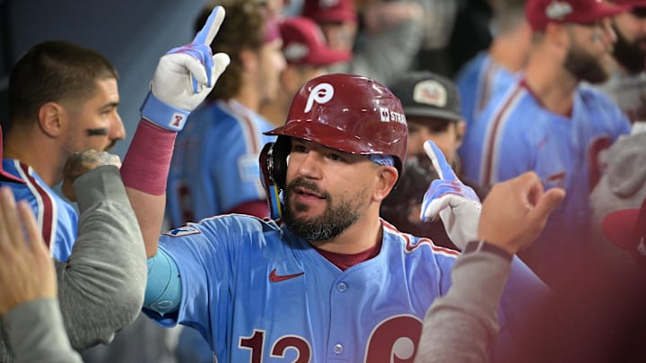 Philadelphia Phillies designated hitter Kyle Schwarber (12) celebrates in the dugout after hitting a solo home run during the fourth inning against the Los Angeles Dodgers during game three of the NLDS round for the 2025 MLB playoffs at Dodger Stadium. 
