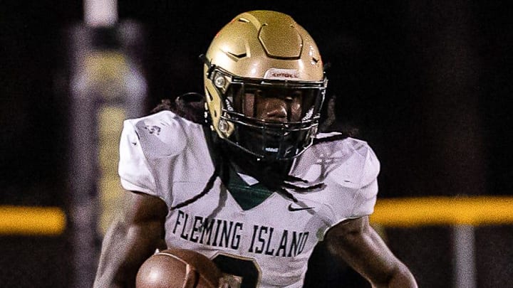 Sam Singleton (2) runs the ball downfield during the first half of the game at Citizens Field in Gainesville, FL on Thursday, October 27, 2022. [Jesse Gann/Gainesville Sun]

Flgai 102722 Hsfb Buchholzvsflemingisland 6146 Jessegann