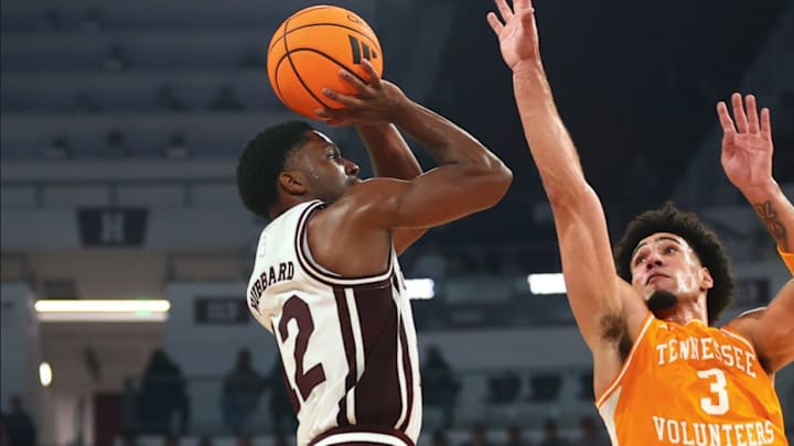 Mississippi State Bulldogs guard Josh Hubbard puts up a shot against the Tennessee Volunteers' Bishop Boswell in a game at Humphrey Coliseum in Starkville, Miss.