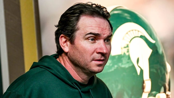 Michigan State coach Jonathan Smith takes the podium before talking to the media on the first national signing day for college football recruits Wednesday, Dec. 20, 2023, at Spartan Stadium in East Lansing.