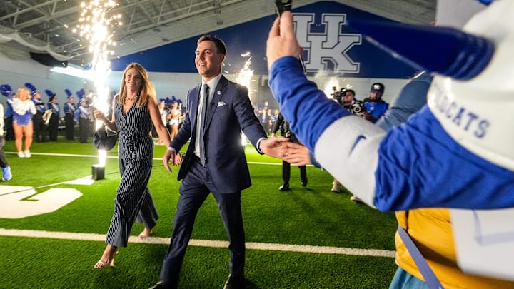 New Kentucky Wildcat head coach Will Stein arrives with wife, Darby has he is introduced at Kentucky on Wednesday, December 3, 2025 New Kentucky Wildcat head coach Will Stein arrives with wife, Darby has he is introduced at Kentucky on Wednesday, December 3, 2025