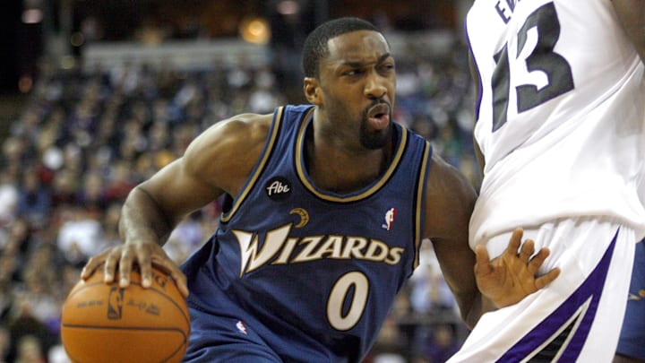 Dec 16, 2009; Sacramento, CA, USA; Washington Wizards guard Gilbert Arenas (0) tries to get around Sacramento Kings guard Tyreke Evans (13) in the first half at Arco Arena. Mandatory Credit: Cary Edmondson-Imagn Images Dec 16, 2009; Sacramento, CA, USA; Washington Wizards guard Gilbert Arenas (0) tries to get around Sacramento Kings guard Tyreke Evans (13) in the first half at Arco Arena. Mandatory Credit: Cary Edmondson-Imagn Images