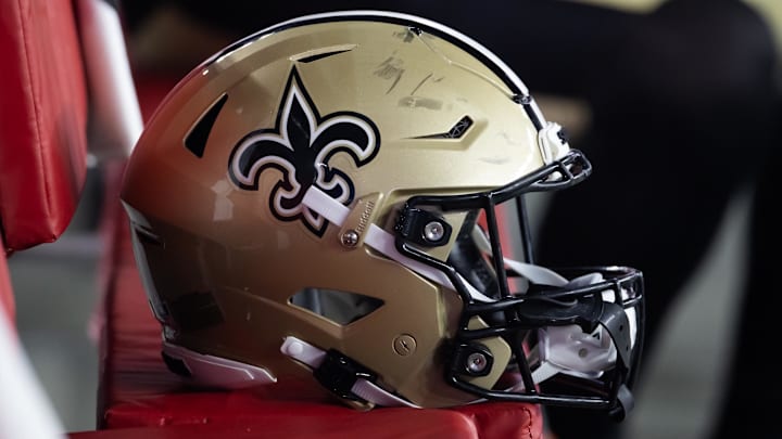 Aug 10, 2024; Glendale, Arizona, USA; Detailed view of a New Orleans Saints helmet during a preseason NFL game at State Farm Stadium. Mandatory Credit: Mark J. Rebilas-Imagn Images