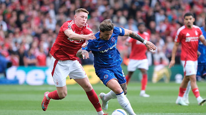 Elliot Anderson of Nottingham Forest competes for the ball...