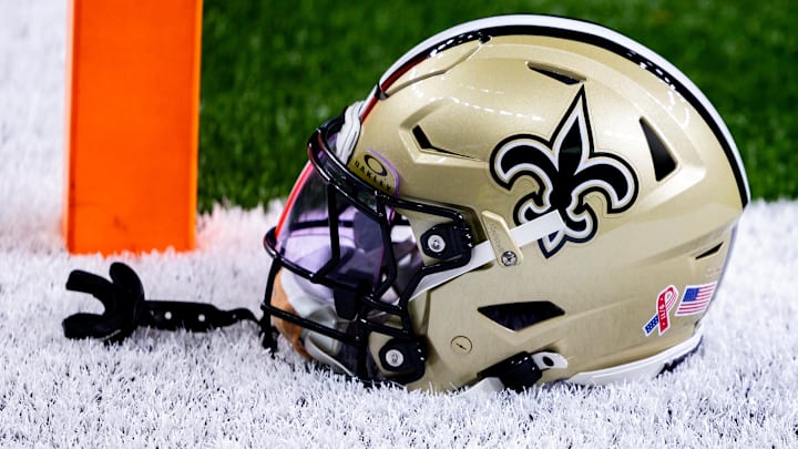 Sep 8, 2024; New Orleans, Louisiana, USA;  Detailed view of the New Orleans Saints football helmet before the game against the Carolina Panthers during the pregame at Caesars Superdome. Mandatory Credit: Stephen Lew-Imagn Images