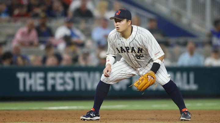 Mar 21, 2023; Miami, Florida, USA; Japan third baseman Munetaka Murakami (55) plays his position during the sixth inning against the USA at LoanDepot Park. Mandatory Credit: Sam Navarro-Imagn Images