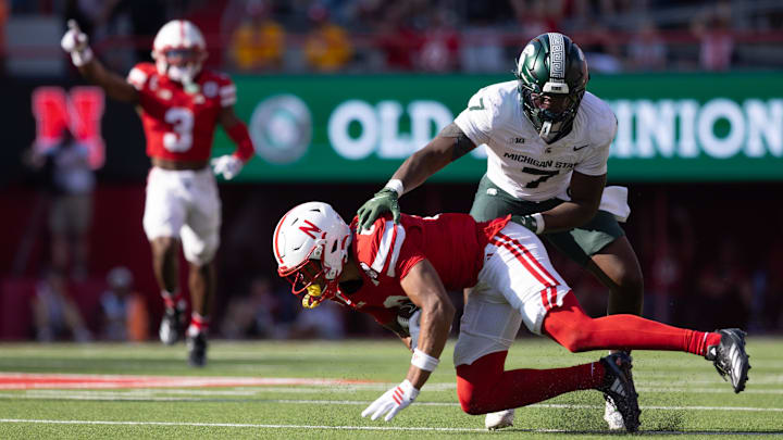 Nebraska defensive back DeShon Singleton makes an interception against Michigan State at Memorial Stadium. Nebraska defensive back DeShon Singleton makes an interception against Michigan State at Memorial Stadium.