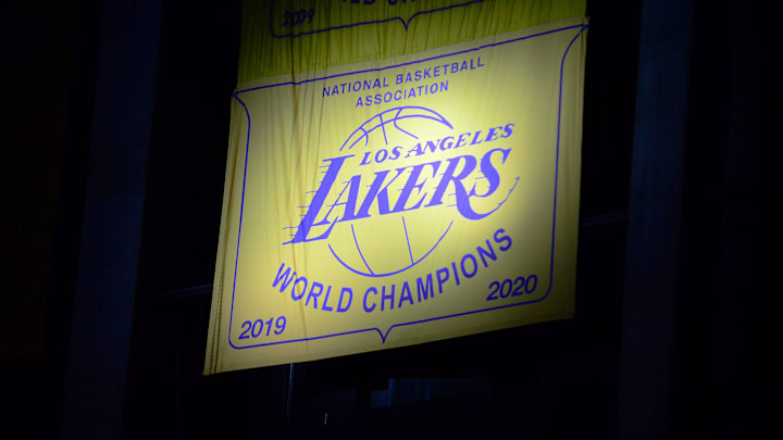 May 12, 2021; Los Angeles, California, USA; The Los Angeles Lakers 2020 champions banner is revealed before the game against the Houston Rockets at Staples Center. Mandatory Credit: Gary A. Vasquez-Imagn Images
