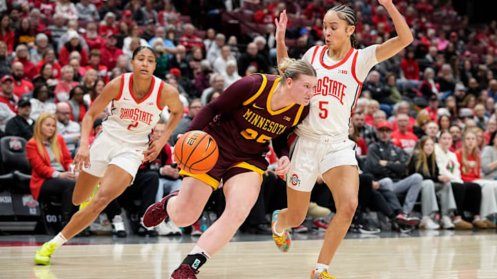 Ohio State Buckeyes guard Ava Watson (5) defends Minnesota Golden Gophers guard Grace Grocholski (25) during the first half of the NCAA women's basketball game at Value City Arena in Columbus on Feb. 13, 2025. Ohio State Buckeyes guard Ava Watson (5) defends Minnesota Golden Gophers guard Grace Grocholski (25) during the first half of the NCAA women's basketball game at Value City Arena in Columbus on Feb. 13, 2025.