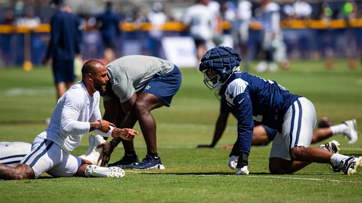 Dallas Cowboys stars Dak Prescott and Micah Parsons during training camp at Marriott Residence Inn-River Ridge playing fields. 