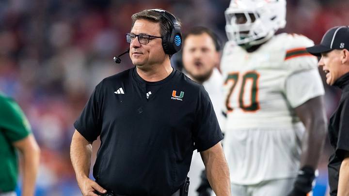Jan 8, 2026; Glendale, AZ, USA; Miami Hurricanes offensive coordinator Shannon Dawson against the Mississippi Rebels during the 2026 Fiesta Bowl and semifinal game of the College Football Playoff at State Farm Stadium. Mandatory Credit: Mark J. Rebilas-Imagn Images