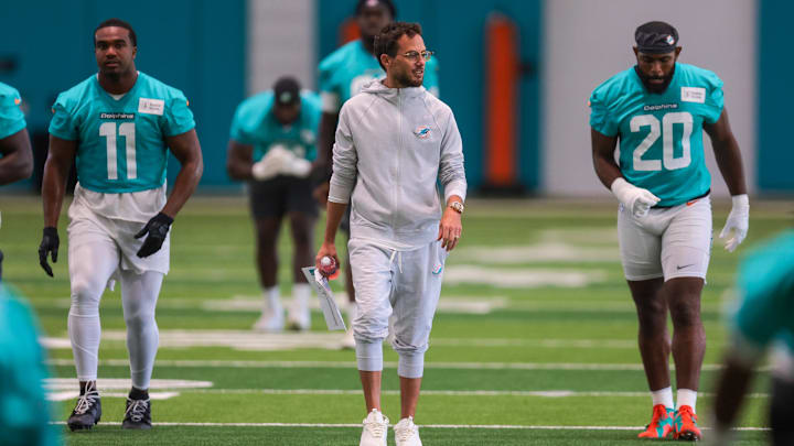 Miami Dolphins head coach Mike McDaniel watches practice during mandatory minicamp at Hard Rock Stadium.
