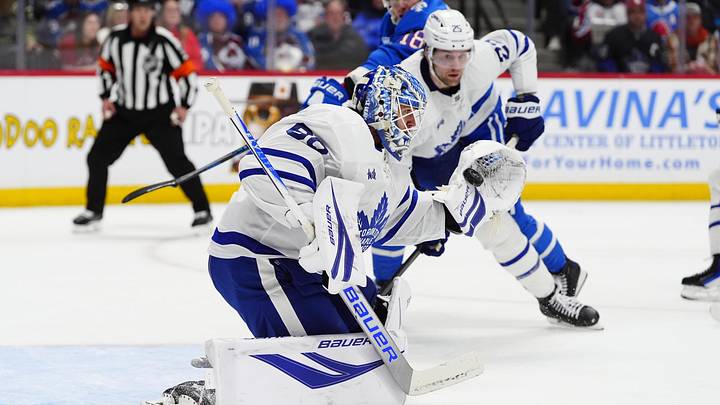 Jan 12, 2026; Denver, Colorado, USA; Toronto Maple Leafs goaltender Joseph Woll (60) makes a save in the second period against the Colorado Avalanche at Ball Arena. Mandatory Credit: Ron Chenoy-Imagn Images