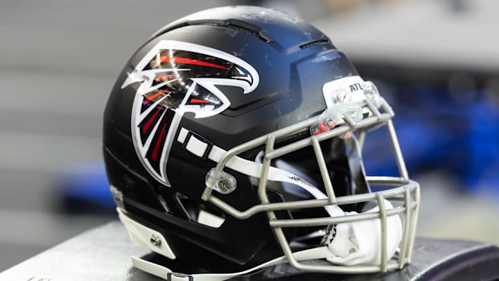 Dec 21, 2025; Glendale, Arizona, USA; Detailed view of an Atlanta Falcons helmet at State Farm Stadium. Mandatory Credit: Mark J. Rebilas-Imagn Images