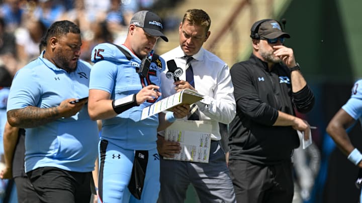 Brock Huard works the sidelines during an Arlington Renegades and Birmingham Stallions game. 