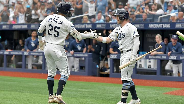 Sep 20, 2026; St. Petersburg, Florida, USA; Tampa Bay Rays outfielder Victor Mesa (25) celebrates a run with teammate short stop Taylor Walls (6) during the fourth inning against Boston Red Sox at Tropicana Field. Mandatory Credit: Pablo Robles-Imagn Images Sep 20, 2026; St. Petersburg, Florida, USA; Tampa Bay Rays outfielder Victor Mesa (25) celebrates a run with teammate short stop Taylor Walls (6) during the fourth inning against Boston Red Sox at Tropicana Field. Mandatory Credit: Pablo Robles-Imagn Images