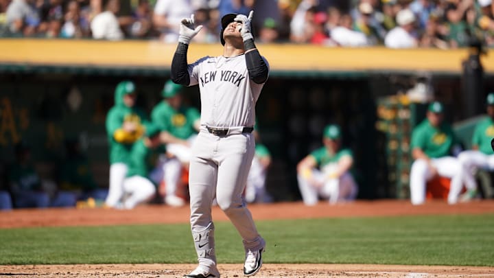 Sep 22, 2024; Oakland, California, USA; New York Yankees left fielder Jasson Dominguez (89) steps on home plate after hitting a two-run home run against the Oakland Athletics in the second inning at the Oakland-Alameda County Coliseum. 