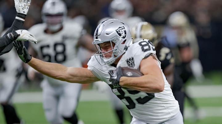 Dec 29, 2024; New Orleans, Louisiana, USA; Las Vegas Raiders tight end Brock Bowers (89) runs against New Orleans Saints safety Tyrann Mathieu (32) during the third quarter at Caesars Superdome. Mandatory Credit: Matthew Hinton-Imagn Images