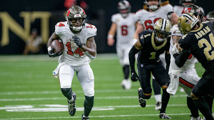 Oct 13, 2024; New Orleans, Louisiana, USA; Tampa Bay Buccaneers wide receiver Chris Godwin (14) cruises for a touchdown during the third quarter against the New Orleans Saints at Caesars Superdome.