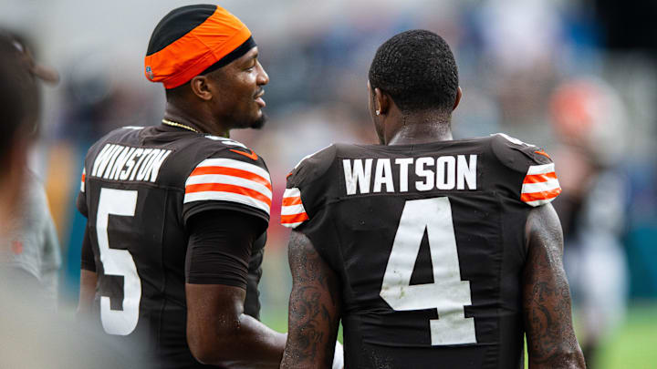 Cleveland Browns quarterback Jameis Winston (5) talks with quarterback Deshaun Watson (4) in the fourth quarter at EverBank Stadium.