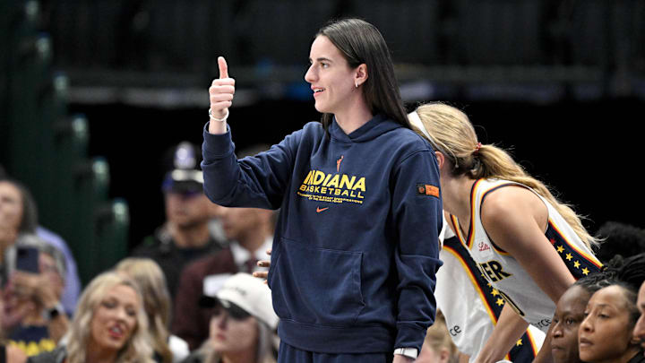Aug 1, 2025: Indiana Fever guard Caitlin Clark (22) gives a thumbs up against the Dallas Wings at the American Airlines Center.