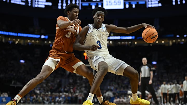 Mar 19, 2026; Portland, OR, USA; BYU Cougars forward AJ Dybantsa (3) dribbles against Texas Longhorns forward Dailyn Swain (3) in the second half during a first round game of the men's 2026 NCAA Tournament at Moda Center. Mandatory Credit: Troy Wayrynen-Imagn Images Mar 19, 2026; Portland, OR, USA; BYU Cougars forward AJ Dybantsa (3) dribbles against Texas Longhorns forward Dailyn Swain (3) in the second half during a first round game of the men's 2026 NCAA Tournament at Moda Center. Mandatory Credit: Troy Wayrynen-Imagn Images