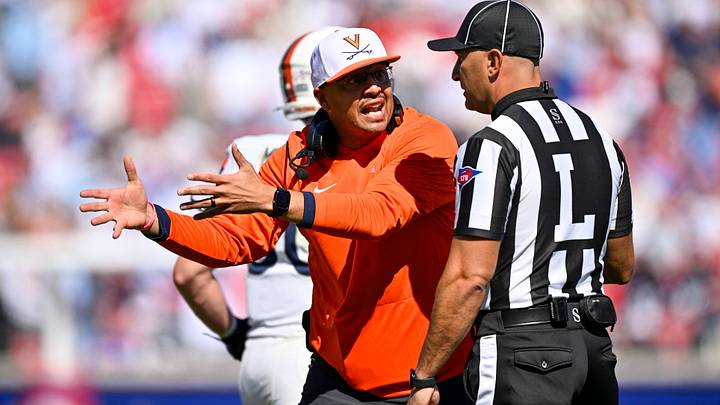 Oct 17, 2026; Dallas, Texas, USA; Virginia Cavaliers head coach Tony Elliott argues a call during the first half against the SMU Mustangs at Gerald J. Ford Stadium. Mandatory Credit: Jerome Miron-Imagn Images Oct 17, 2026; Dallas, Texas, USA; Virginia Cavaliers head coach Tony Elliott argues a call during the first half against the SMU Mustangs at Gerald J. Ford Stadium. Mandatory Credit: Jerome Miron-Imagn Images