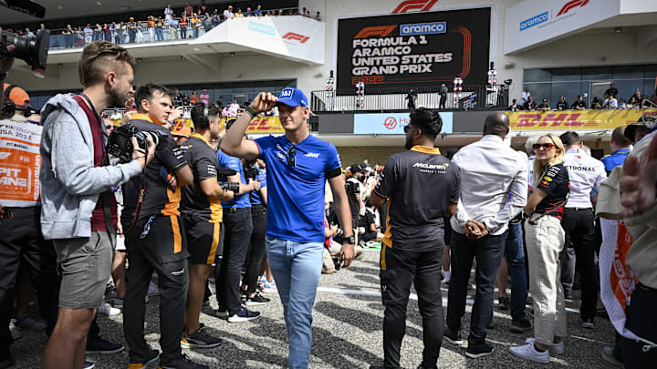 Oct 23, 2022; Austin, Texas, USA; Haas F1 Team driver Mick Schumacher (47) of Team Germany walks on to the track before the running of the U.S. Grand Prix F1 race at Circuit of the Americas. Mandatory Credit: Jerome Miron-Imagn Images