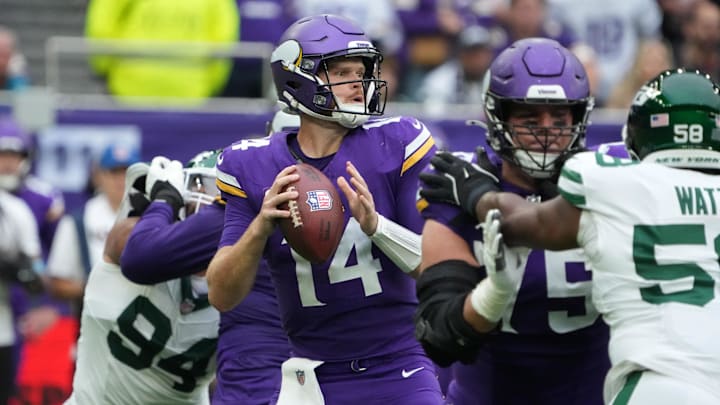 Oct 6, 2024; London, United Kingdom; Minnesota Vikings quarterback Sam Darnold (14) throws the ball against the New York Jets in the first half at Tottenham Hotspur Stadium.