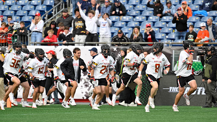 May 24, 2025; Foxborough, MA, USA; The Maryland Terrapins storm the field after defeating the Syracuse Orange in the NCAA DI Men's Lacrosse National Championship Semifinal at Gillette Stadium.