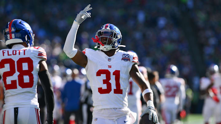 Oct 6, 2024; Seattle, Washington, USA; New York Giants safety Tyler Nubin (31) celebrates after recovering a Seattle Seahawks fumble during the second half at Lumen Field. Oct 6, 2024; Seattle, Washington, USA; New York Giants safety Tyler Nubin (31) celebrates after recovering a Seattle Seahawks fumble during the second half at Lumen Field.